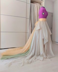 Gorgeous multi color wedding skirt with a long train and beautifully draped! ❤️ This beautiful design is made of cream, peachy/goldish and sage green combination. Perfect choice for your special day or photo session! You can order it in different color combinations too or all to be one color. No extra cost. What you have to send when you place an order:  1. Waist round measurement. (cm or inch) This is the thinnest part over belly button. 2. Straight line from waist to the floor. This is not the skirt length. 3. If you want to change the colors. 4 Phone number for delivery. NOTE: Real colors can't be 100% same as the pics because of camera and monitor effect!  ALL SALES FINAL. This shop is custom shop and when you place an order you agree with refunds and exchanges section. Please read it Floor-length Ruffled Maxi Skirt For Wedding, Wedding Floor-length Ruffled Maxi Skirt, Flowy Beige Skirt For Wedding, Beige Flowy Skirt For Wedding, Elegant Yellow Skirt For Wedding, Cream Flowy Wedding Skirt, Cream Flowy Skirt For Wedding, Flowy Green Wedding Dress, Green Flowy Wedding Dress