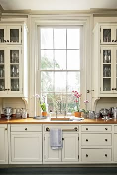 an open book shows the inside of a kitchen