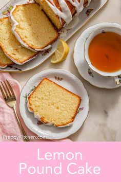 lemon pound cake with white icing on a plate next to a cup of tea