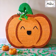 there is a pumpkin made out of paper