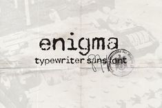 an old typewriter sansign with the word enigma written in black ink