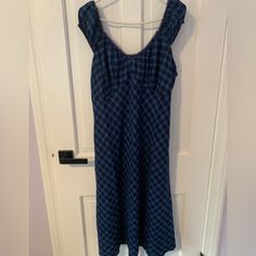 Forever 21+ - A Woven Midi Dress Featuring An Allover Plaid Pattern, Sweetheart Neckline, Square-Cut Back, Shirred Bust, Cap Puff Sleeves, Picot Trim, And An A-Line Silhouette. New Condition Not Worn Blue Fitted Lined Sundress, Blue Lined Midi Sundress, Blue Empire Waist Dress For Daywear, Casual Blue Empire Waist Dress, Forever 21 Fitted V-neck Midi Dress, Fitted Casual Sundress By Forever 21, Casual Fitted Sundress By Forever 21, Fitted Sleeveless Sundress By Forever 21, Fitted Sleeveless Sundress From Forever 21