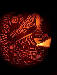 a pumpkin carved to look like a train