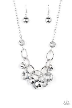 Rhinestone River Silver Necklace - Paparazzi Accessories A collection of round, glassy silver beads in varying sizes swirl around shiny silver oval links hammered in texture. The beveled shape and faceted surfaces of the beads are brushed in a subtle reflective glaze, creating a dreamy display as they drip below the collar. Features an adjustable clasp closure. Sold as one individual necklace. Includes one pair of matching earrings.