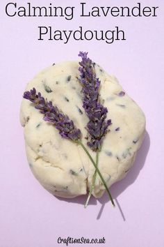 a close up of a piece of food on a purple background with the words calming lavender playdouh