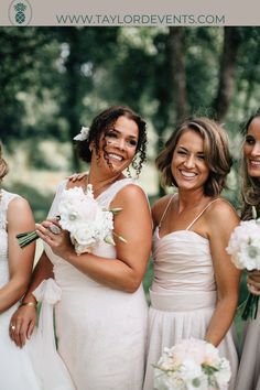 four bridesmaids pose for a photo together