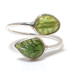 *N A T U R A L  B A G U E T T E ∙ S T O N E ∙ R I N G* PERIDOT:-  Peridot is a gem with significant historical ties, adorning some of the world's most beautiful royal and sacred objects. Peridot colors vary between greenish yellow, yellow-green, yellowish, green, and olive green.  From Neckletsn Experience stunning jewelry that compliments your style every day any time, All the items in my shop are handmade and are crafted by our best workers in our workshop, We pay a lot of emphasis on the making of the ring and we always assure you that we will provide the best quality products every time. Each piece is completely handmade.   Material: High Quality Solid 925 Sterling Silver, Neckletsn is making a different product. Durable and healthy, longer lasting for daily wear. High-polish finished Green Sterling Silver Stackable Rings For May Birthstone, Green Stackable Sterling Silver Rings, Green Sterling Silver Nature-inspired Ring, Green Nature-inspired Sterling Silver Rings, Green Sterling Silver Stackable Open Rings, Adjustable Green Nickel-free Ring, Green Peridot Rings With Nature-inspired Style, Green Sterling Silver Stackable Jewelry, Adjustable Green Hallmarked Jewelry