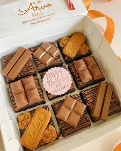 a box filled with lots of different types of chocolates