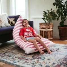 The product can hold up to 1000lbs. Features a unique specialty shape. Ottomans are one of the most versatile accents in the home with the ability to double as footrest, seat, or make-shift table. Perfect as a bean bag floor chair substitute. Striped pink and white ottoman cover. Made with comfortable microfiber material. Practicality and fashion mix together with this handy 35-inch pink and white microfiber specialty striped pouf cover. Expertly upholstered with padding and soft microfiber in a White Ottoman, Ottoman Cover, Hold Ups, Bean Bag, Quality Furniture, Floor Chair, Pink And White, Living Room Furniture, Home Furniture