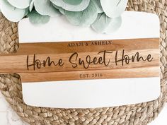 a wooden sign that says home sweet home