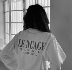 the back of a woman's shirt that says le nuage you loved me first