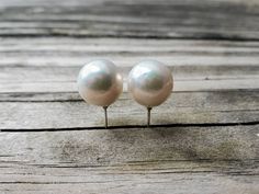 "Large freshwater pearl stud earrings with solid sterling silver 925 silver,11-12mm Edison baroque pearl earrings, June birthday gift Handcrafted! Real pearls! This pair of earrings features a pair of 2 rosy nearly-round freshwater cultured pearls \"Edison pearls\", they're more shiny, with more vibrant colors and can get larger than regular freshwater cultured pearls. These 2 pearls are nearly-round/ oval with great iridescence and luster, there's some minor natural growth marks. The pearls are Silver Jewelry With Pearl Buttons As Gift, Baroque Pearl Earrings In White, Classic Round Baroque Pearl Earrings, March Birthstone Necklace, Edison Pearls, Silver Statement Earrings, June Birthday, June Birthstone Jewelry, Baroque Pearl Earrings