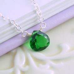 "This emerald green quartz necklace is such an elegant choice for a May birthday gift. Lightweight, sterling silver chain extends down to an emerald green quartz gemstone. This 8mm wide green quartz is an ideal substitute for real emerald, and the vivid green is so pretty. The stone itself is approx. 8mm in size. Small green gemstones connect the sterling lobster clasp. I have created this necklace to grow with your child. The clasp may be fastened at any point along the sterling silver extender Emerald Green Necklace, Jewelry Kids, May Birthday, May Birthstone, Pretty Necklaces, Green Quartz, Unique Jewelry Designs, Girls Necklaces, Green Necklace