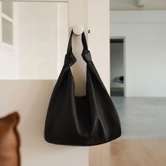 Discover Elegance and Comfort Step into the world of luxury and style with our Korean Oversized Soft Genuine Leather Hobo Shoulder Bag. Designed exclusively for the fashion-forward woman, this bag blends timeless elegance with a modern twist. The ultra-soft cowhide leather ensures a sumptuous feel, while the versatile patchwork design adds a unique touch to your everyday ensemble. Exceptional Craftsmanship Crafted from premium genuine leather, this shoulder bag promises not only style but also d Elegant Large Capacity Baguette Bag For Travel, Elegant Rectangular Hobo Bag In Soft Leather, Elegant Baguette Bag With Large Capacity For Travel, Elegant Black Hobo Shoulder Bag, Chic Large Capacity Hobo Bag For Travel, Elegant Rectangular Hobo Bag For Travel, Chic Hobo Shoulder Bag For Shopping, Chic Office Hobo Bag With Large Capacity, Elegant Hobo Bag With Handles For Travel