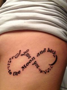 a woman with a tattoo on her stomach saying love and baby to the moon and back