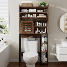 a white toilet sitting in a bathroom next to a wooden shelf filled with lots of items