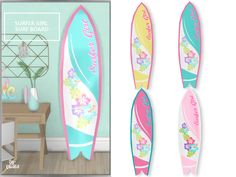 two surfboards with flowers on them are next to a wall