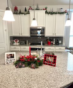 the kitchen counter is decorated with christmas decorations