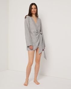 Designed in a mini crossover silhouette, this Air Linen Wrap Dress is cut from a breezy linen blend, with wide sleeves and a functional side tie. Chic Mini Wrap Dress With Tie Waist, Spring Daywear Wrap Dress, Fall Daywear Wrap Dress, Spring Wrap Mini Dress With Tie Waist, Daywear Mini Dress With Tie Fastening, Chic Wrap Dresses For Loungewear, Chic Loungewear Dress With Tie Waist, Chic Wrap Dress With Tie Fastening For Spring, Spring Chic Mini Dress With Tie Sleeves