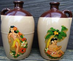 two ceramic vases decorated with hawaiian images