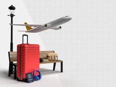 an airplane is flying over a bench with luggage and other items on it, including a suitcase