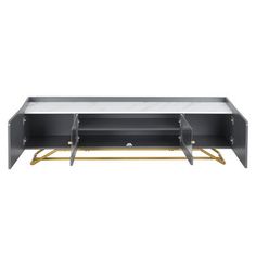 a black and gold coffee table with two shelves