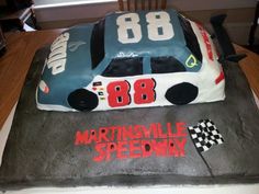 a birthday cake made to look like a race car