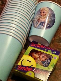 an open book with pictures on it and the words smile live out loud diy frozen movie birthday party