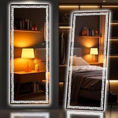 two mirrors that have lights on them in the shape of a rectangle mirror, and one has a lamp next to it