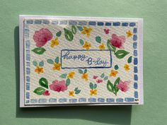 a card with flowers on it that says happy birthday