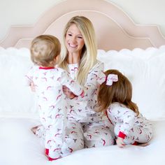 Get into the Christmas spirit with matching pajamas for you and your little ones! This women's pajama set features our classic Vintage Santa print and includes charming henley button details. The set includes a long-sleeve pajama top and coordinating pull-on pajama pants. Add a monogram for a personalized Christmas look! For a relaxed fit, please size up. XXS (0-2)XS (2-4)Small (4-6)Medium (6-8)Large (8-10)XL (12-14) Holiday Family Matching Loungewear Sleepwear, Holiday Playful Sleepwear, Matching Holiday Sleepwear For Pajama Party, Matching White Christmas Sleepwear, White Matching Christmas Sleepwear, White Matching Winter Sleepwear, Holiday White Bedtime Sets, White Holiday Bedtime Sets, White Bedtime Sets For Holidays