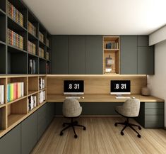 two computer desks with bookshelves behind them in a room that has wood flooring