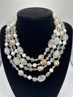 "Vintage Flapper Glass Beads, a classic of those times (think Great Gatsby!). This quality made necklace measures 64\" and hand knotted between each bead. Knotting is done to help the beaded necklace drape better.  Marked W Germany, the clasp is decorated with two AB beads attached by wire.  The clasp appears to be silver plate. Fine antique condition - 100 years old and a fun piece calling to be out and about!" Bead Knotting, Burlington Vt, Full Life, Art Deco Necklace, Turquoise Rings, Great Gatsby, Sterling Silver Cuff, Glass Bead Necklace, Crystal Gems