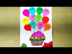 a birthday card with a cupcake and balloons