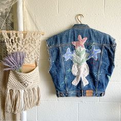 Such A Lovely, Unique And One Of A Kind Piece Of Art Which Is Timeless. A Classic Denim Vest With Large Embroidery On The Back And Paint Splatter Detailing Throughout And Distressed Sleeve Cuffs. Condition: New (With Tag) Color: Denim Contents: 100% Cotton Care: Machine Wash Cold Measurements: Pit To Pit: 24” Length: 25” From Free People: Please Note: Due To The Handmade Nature Of This Style, Each Piece Is Unique And May Vary From The Photo. Reworked From Handpicked Textiles, This Effortlessly E Spring Denim Blue Recycled Denim Outerwear, Spring Denim Vest With Pockets In Recycled Material, Spring Medium Wash Recycled Denim Vest, Blue Relaxed Fit Denim Vest For Spring, Relaxed Fit Blue Denim Vest For Spring, Spring Patchwork Denim Vest In Blue, Blue Bohemian Denim Vest For Spring, Bohemian Blue Denim Vest For Spring, Spring Denim Blue Recycled Denim Vest