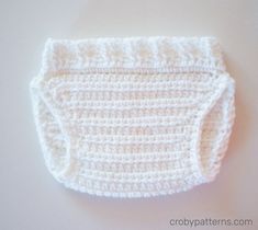 a crocheted diaper on a white surface