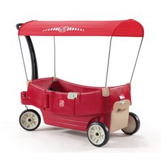 a red toy wagon with the top summer toys logo above it