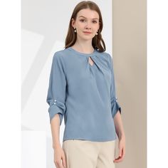 A comfy solid-color shirt is updated with perfectly pleated 3/4 sleeves for understated charm. Made of soft Chiffon fabric, this button-closure blouse with keyhole back detailing is designed for easy-to-wear, and ensures you stay comfy all day long. Styled with a simple round neck with a keyhole along with delicate pleated details on the 3/4 sleeves, it brings elegant impact to your basic wardrobe. Elegant Solid Color Top With 3/4 Sleeves, Blue Pleated Sleeve Tops For Work, Solid Color Top With 3/4 Sleeves For Work, Solid Color Tops For Workwear With 3/4 Sleeves, Solid Color Workwear Tops With 3/4 Sleeves, Solid Workwear Tops With 3/4 Sleeves, Elegant Blue Blouse With 3/4 Sleeves, Basic Wardrobe, Solid Color Shirt