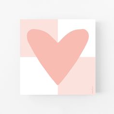 a pink and white square with a heart on it