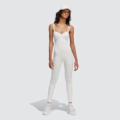 Description Adidas X Ivy Park Returns With A Winter Chic Performance Collection That Includes This Adidas Ivy Park Cat Suit. The Flexible, Circular Knit Design Follows The Natural Curve Of The Body And Comes Equipped With Adjustable Double Straps - Adidas Ivy Park Cat Suit Core White - Adjustable Double Straps - Padded Cups - "Ivy" On One Leg, "Park" On The Other - Adidas Badge Of Sport At Centre Back - Seamless - 45% Polyester, 43% Nylon, 12% Elastane Seamless - Order Your Usual Women’s Size Fo High Stretch White Jumpsuit And Romper For Spring, High Stretch White Jumpsuits And Rompers For Spring, High Stretch White Jumpsuit For Spring, White High Stretch Workout Jumpsuit, Sporty High Stretch White Jumpsuits And Rompers, White Athleisure Bodysuit For Summer, Sporty High-stretch White Jumpsuit/romper, Sporty White High-stretch Jumpsuits And Rompers, Sporty High-stretch White Jumpsuits And Rompers