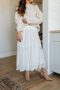 Embrace your free-spirited style with the Boho Lace Skirt, an effortless blend of elegance and bohemian charm. This ethereal skirt features intricate lace detailing throughout, adding a touch of vintage romance to your look. The lightweight fabric flows gracefully, creating a feminine silhouette perfect for any occasion. Whether you're dressing up for a special event or keeping it casual with a cozy sweater and boots, this skirt will be your go-to piece for a boho-chic vibe. Ethereal Skirt, Free Spirit Style, Vintage Romance, Boho Lace, Feminine Silhouette, Cozy Sweater, Free Spirited, Cozy Sweaters, Lightweight Fabric