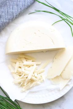 the cheese is cut up and ready to be put into the dish on the plate