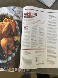 a cookbook opened to an article about tamale the turkey on a plate with cranberries and oranges