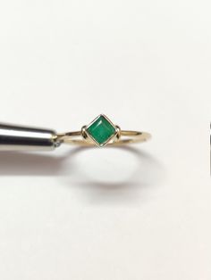 18K Gold Emerald Dainty Ring Solid Gold Emerald Ring 4 mm Square Emerald Ring Hallmarked 18K Gold Stacking Ring Natural Emerald Ring Men Metal : Yellow Gold Metal Carat : 18K Gemstone : Natural Emerald Stone Weight : 0.35 Ct Weight (US 5-US 18) : 1.5 gm - 2 gm approx. Ring Size: US 5-US 18 ✱Custom Order We love to accept Custom Order so feel free to throw us anything ✱Note : 1). Don't find your ring size or gemstone feel free to message me 2). Need this ring in another metal silver , white gold May Birthstone Princess Cut Emerald Ring In Yellow Gold, Yellow Gold Emerald Ring With Princess Cut For Promise, Princess Cut Yellow Gold Rings For May Birthstone, Yellow Gold Princess Cut Rings For May Birthstone, Yellow Gold Emerald Princess Cut Promise Ring, Gold Stackable Diamond Ring, Classic Stackable Round Cut Emerald Ring, Heirloom Gold Emerald Stackable Ring, Classic Stackable Emerald Ring With Round Cut