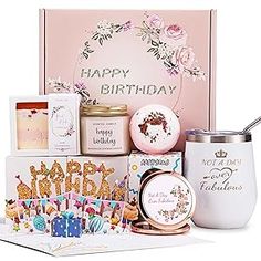 a birthday gift hamper with candles, cookies and other items for someone's special occasion