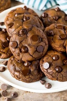 a plate full of chocolate chip cookies on a table