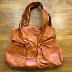 Ada Leather Hobo Shoulder Bag Purse Cognac Bohemian Euc Artisan Crafted Tote This Gorgeous Bag Is Stunning And In Beautiful Condition. The Leather Is Soft And Supple With Unique Design. The Straps Feel Great On Your Shoulder Or The Crook Of Your Arm. The Bag Has Magnetic Closure For Ease Of Entry And Secure As Well. The Inside Has A Zip Pocket And Two Flat Pockets. It Also Has A Leather Pocket For A Phone Holder. The Inside Has A Leather Key Tether With A Silver Clasp. You Will Love This Bag! Th Versatile Cognac Hobo Shoulder Bag, Cognac Textured Leather Hobo Shoulder Bag, Cognac Hobo Bag With Detachable Handle, Leather Cognac Hobo Bag For On-the-go, Cognac Hobo Bag With Adjustable Strap For On-the-go, Craft Tote, Leather Hobo, Leather Key, Gorgeous Bags