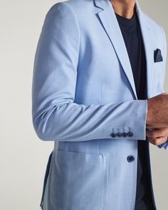 A 4-way stretch blazer crafted in a softer-than-ever fabric blend that promises unmatched comfort and ease. Features a contrast butterfly jacquard lining with bound seams. Offered in light blue and oatmeal. Details Model is 6'1" and wears a size medium. Care: No machine wash. Do not bleach. Do not tumble dry. Iron on low. Professional dry clean on short cycle. Composition: 68% Polyester | 28% Rayon | 4% Spandex | 7DIAMONDS Men's Viktor Blazer in Light Blue | Size XL | Polyester/Cotton Light Blue Suit Men, Light Blue Blazer Outfit Men, Light Blue Blazer Outfit, Blue Blazer Outfit Men, Suit Jacket With Jeans, Polo Shirt Outfit Men, Blue Blazer Outfit, Light Blue Blazer, Light Blue Suit