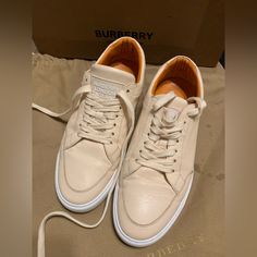 Authentic Burberry Low Top Sneakers Buttery Soft Leather Pale Biscuit Colour Worn Twice Exterior/Interior Is Free Of Scuffs, Wear Or Tear Made In Italy Size 8 Includes Original Box Serial Number - Itmedsrl3vr Biscuit Color, Wear Or Tear, Burberry Shoes, Burberry London, Low Top Sneakers, London England, Womens Shoes Sneakers, Low Top, Soft Leather