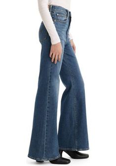 A flared leg adds retro-inspired style to these jeans from Levi's. | Levi's Ribcage Bell Bottom Jeans, 28 x 32 Trendy Full-length Medium Wash Flares, Retro Denim Blue Flares For Spring, Levi's Wide Leg Denim Flare Jeans, Spring Medium Wash Retro Flares, Spring Retro Medium Wash Flares, Levi's High Waist Medium Wash Flare Jeans, Trendy Levi's Dark Wash Flare Jeans, Levi's High Waist Denim Flare Jeans, Levi's High-waist Denim Flare Jeans